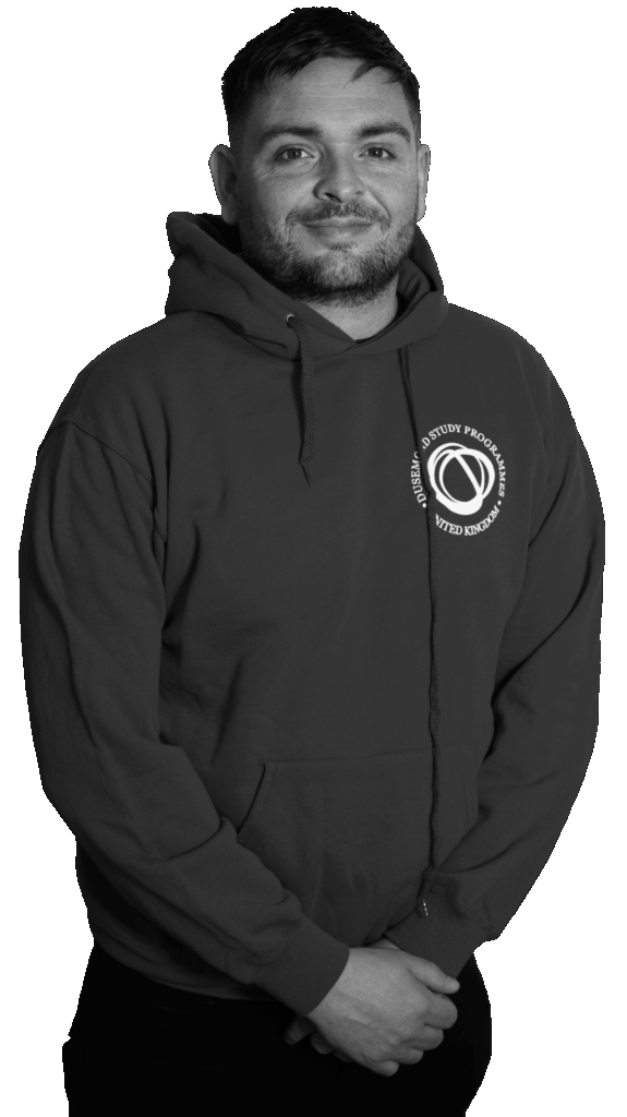 Headshot of Dusemond staff member Joe smiling.